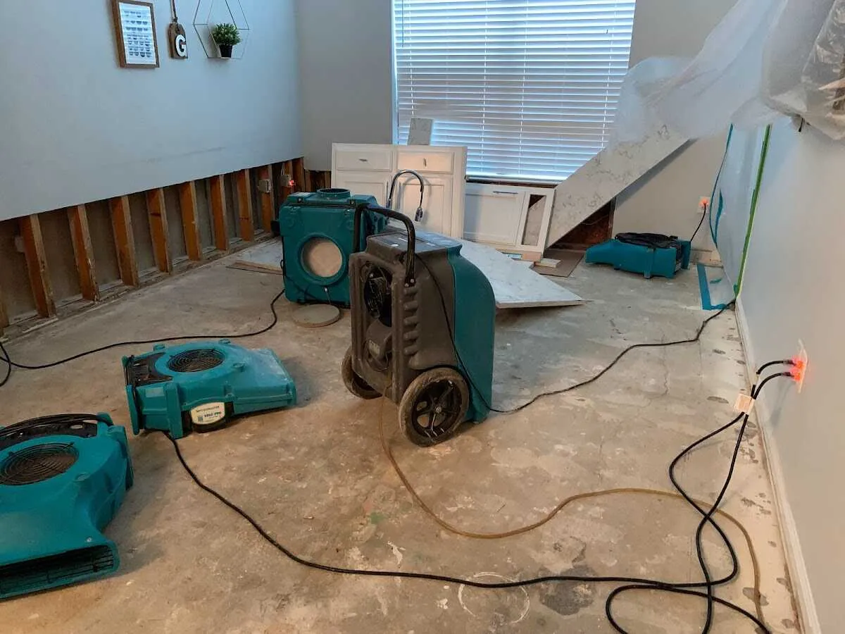 Dehumidifier in flood-cut room for Water Damage Restoration in Sachse